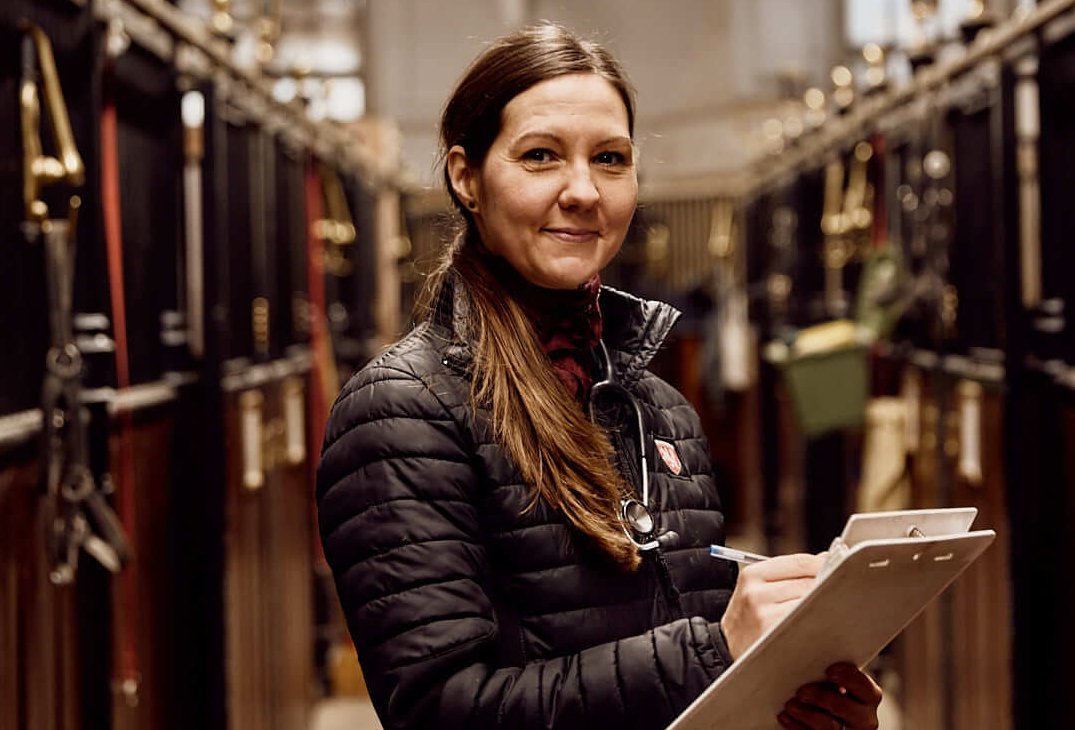 Sophia Sommerauer in the stables of the Spanish Riding School